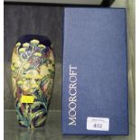 A Moorcroft Herb Collection Tansy vase, impressed mark, with original box, 19cm high