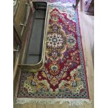 A gold and blue thread prayer rug and three machine made rugs (4)
