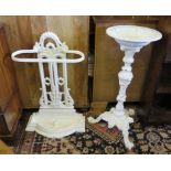 A cast iron jardiniere stand, of baluster and foliate form on a tripod scrolling base, 74cm high