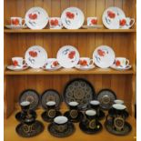 A Denby ware Arabesque pattern tea/coffee service, with six tall cups and saucers, and a Wedgwood