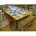 An inlaid top dining table, on turned and block legs joined by an H-stretcher, 190cm x 100cm