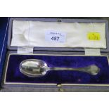 A silver replica of a trefid spoon