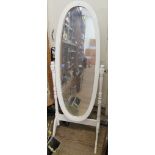 An oak oval wall mirror with bevelled plate, 60cm wide and a painted wood cheval mirror (2)