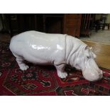 An Italian ceramic model of a white hippopotamus, 84cm long