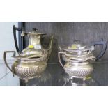 A four piece silver tea and coffee service with ribbed decoration ball feet, London 1915