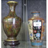 A Japanese cloisonne vase, of tapering form, depicting butterflies and flowers 18.5cm high, and