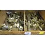 A collection of plated flatware