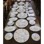 A Minton Haddon Hall tea and dinner service for six places, including coasters, oval side dishes