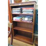 A mahogany open bookcase, with dentil cornice over fixed shelves and a plinth base, 75cm wide x 22cm