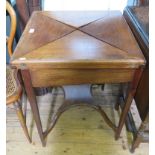 A 1920's mahogany side table, the shaped top and frieze drawer on shell carved cabriole legs and