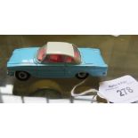 A rare Dinky toy light blue 143 Ford Capri with white roof and red interior, temporary factory