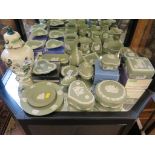 A collection of Wedgwood green Jasperwares, some with boxes and a Masons Chartreuse pattern vase and