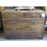 A mahogany chest of drawers with two short and three long graduated drawers on a plinth base,