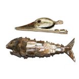 A vintage abalone shell articulated fish, together with a birds head paperclip (2)