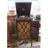 A crossbanded mahogany cased gramophone by His Master's Voice, with diamond shape fretwork speaker