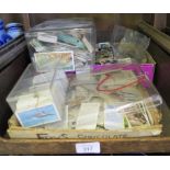 A large collection of loose cigarette cards, Brooke Bond tea cards and others, including vehicles,