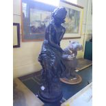 After Moreau Figure of a seated lady holding flowers, resin simulating bronze, signed Moreau Math,