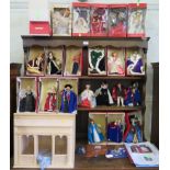 A collection of Peggy Nisbet dolls, and incomplete dolls house shop and a small collection of