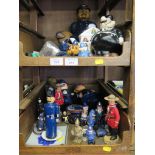 A collection of various police novelty figures and ornaments