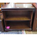 A crossbanded mahogany open bookcase with boxwood stringing and bracket feet, 77cm wide