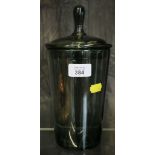 A Stevens and Williams Brierley Hill dark green lidded glass vase designed by Keith Murray, with