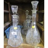 Five various decanters, a bottle and stopper and sherry glasses