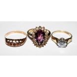 A collection of three dress rings