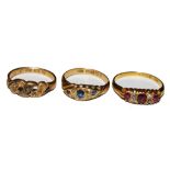 Three 18 carat gold gem set rings