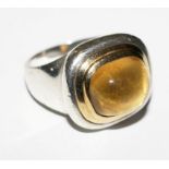 A silver Tiffany ring by Paloma Picasso, set with a cabochon citrine in 18ct gold