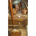 Two pewter plates, and a charger, various copper pails and a warming pan