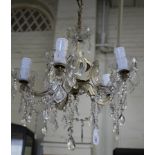 A five branch glass electrolier, with cut glass drip pans, swags and pendants, 42cm diameter