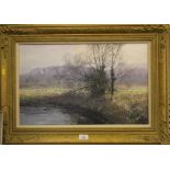 Clive Madgwick Wintry landscape with sheep and river Oil on canvas, signed, 35cm x 55cm