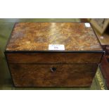 A Victorian burr walnut and ebony strung tea caddy, of rectangular form with two pull out domed