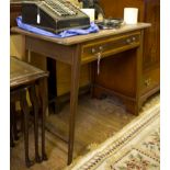 An Edwardian mahogany and satinwood crossbanded ladies writing table, with leather inset top above a