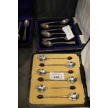 A cased set of silver teaspoons, together with a set of coffee spoons
