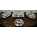 A collection of silver plate to include three entree dishes and a muffin dish