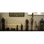 A collection of Papua New Guinea softwood figures and an American candlebox (9)