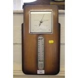 A 1950's oak Federal barometer, in a rectangular case with mercury thermometer, 39cm high