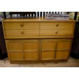 A Nathan Furniture teak side cabinet, with four short drawers above panelled doors on a plinth base,