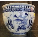 A Chinese blue and white bowl, with panels depicting musicians and figures in landscape, bears