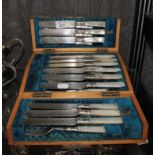 A cased set of knives and forks