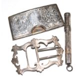 A silver card holder, a silver buckle and a silver pencil, as found