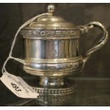 An elaborate silver mustard with snake handle and gilded interior, London marks rubbed