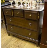 A Stag chest of three short and two long drawers, on bracket feet, 82cm wide