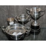 Four small silver trophy cups