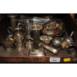 A pair of fluted silver plated candlesticks, a tureen and cover, and other small plated wares