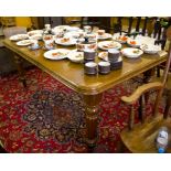 A Victorian walnut extending dining table, the moulded rectangular top on reeded tapering legs,