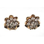 A pair of diamond cluster earrings with post fittings