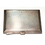 A silver cigarette case with faux tortoiseshell, lined