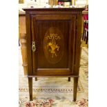 An Edwardian mahogany and satinwood crossbanded bedside cupboard, the panelled door inlaid with a